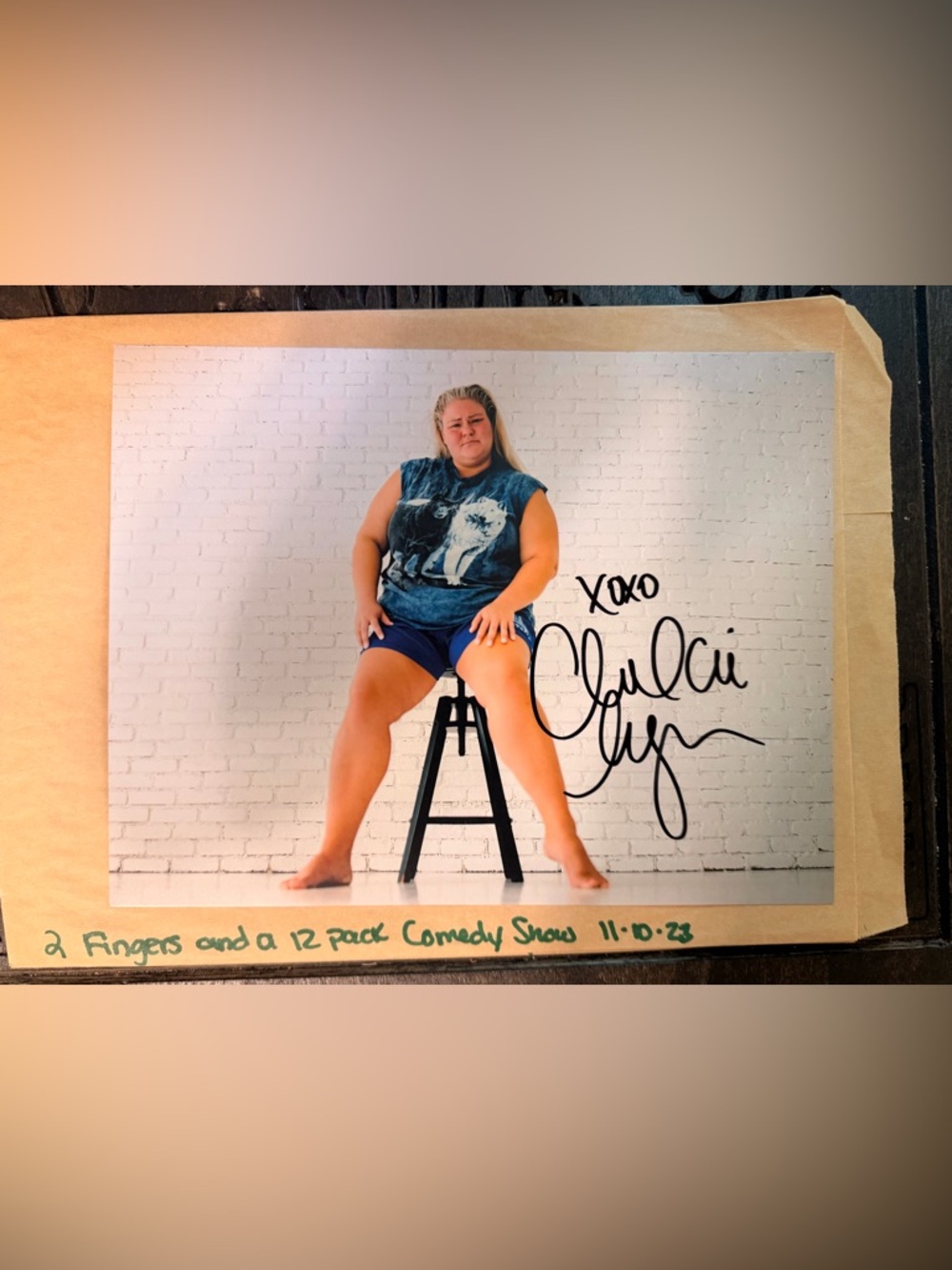 Autographed Comedian Photo of Chelcie Lyn- Blue Tee & Navy Shorts